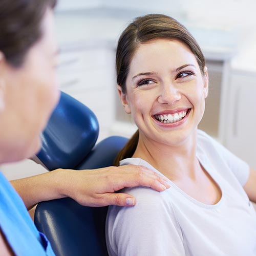 A woman relaxed in a dental treatment chair after receiving sedation dentistry in Issaquah, WA.
